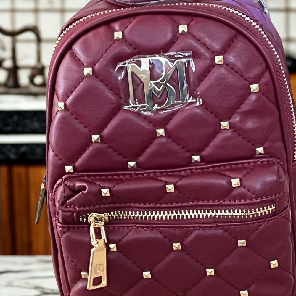 Burgundy Quilted Backpack with Gold Accents